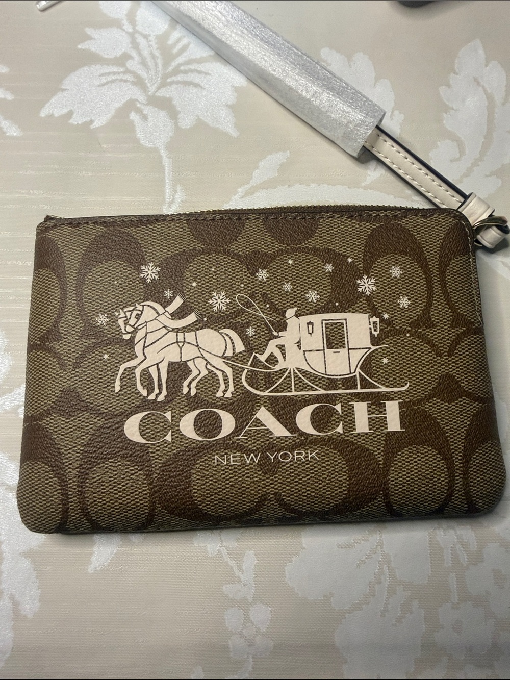 Coach Brown Canvas Wristlet with Cream Coach Carriage Logo